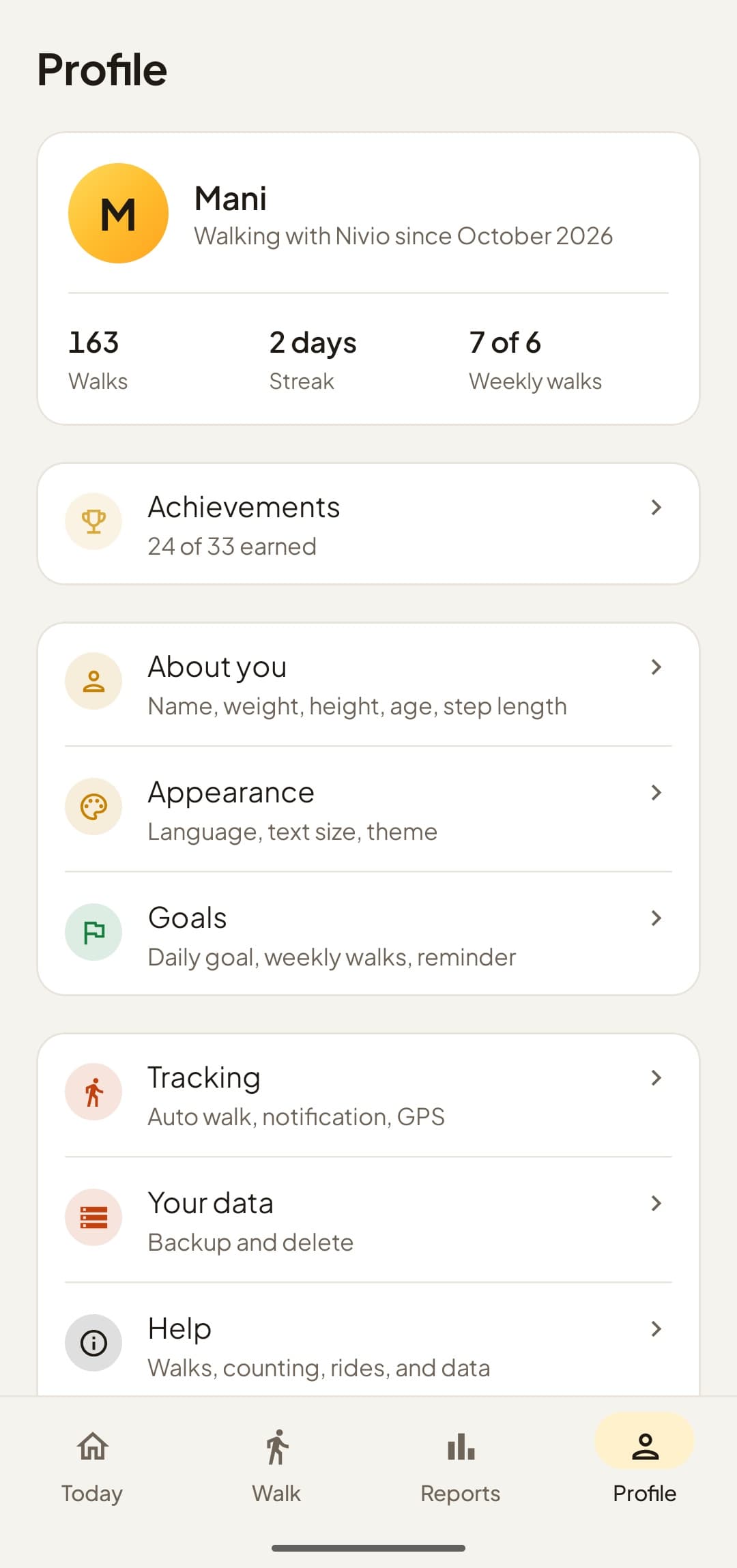 The Profile screen: 163 walks, a 2-day streak, 24 of 33 achievements earned, and rows for About you, Appearance, Goals, Tracking, Your data and Help